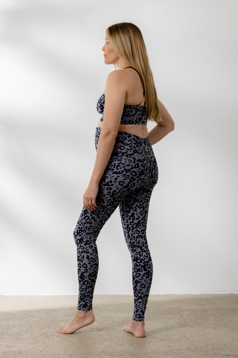 Pregnant woman in Hey Honey Maternity Distorted Animal Magnet leggings, showcasing stylish comfort for yoga and fitness.