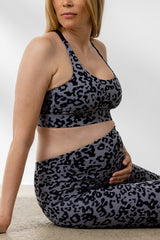 Pregnant woman wearing Hey Honey Maternity Leggings and sports bra in Distorted Animal Magnet print, showcasing comfort and style.