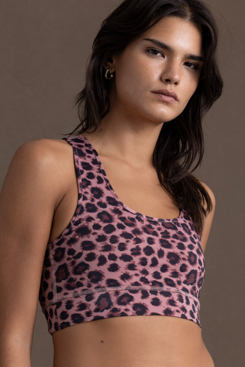 Hey Honey Yoga Bra Leo Rose in leopard print, offering comfort and support for yoga and fitness activities.