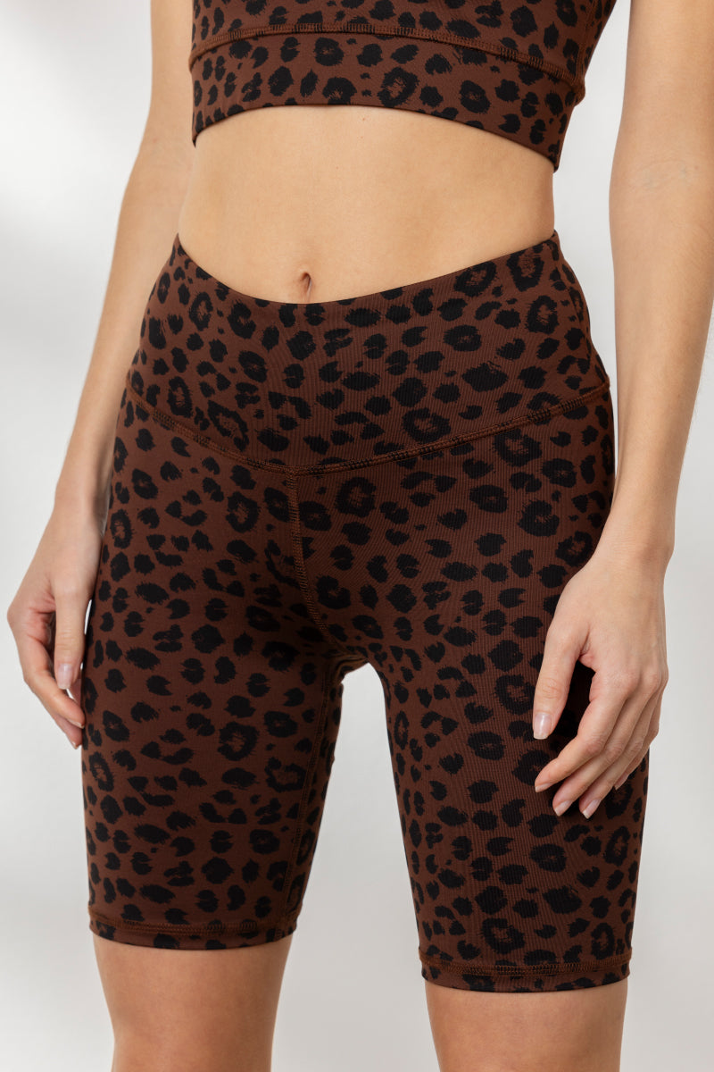 Hey Honey Yoga Biker Leo Chocolate high-waisted leopard print biker shorts, perfect for yoga and fitness activities.