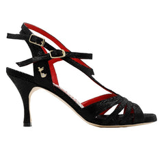 Elegant black Tangolera A100 heels with 7 cm heel, adjustable ankle strap, and vibrant red interior for a stylish look.