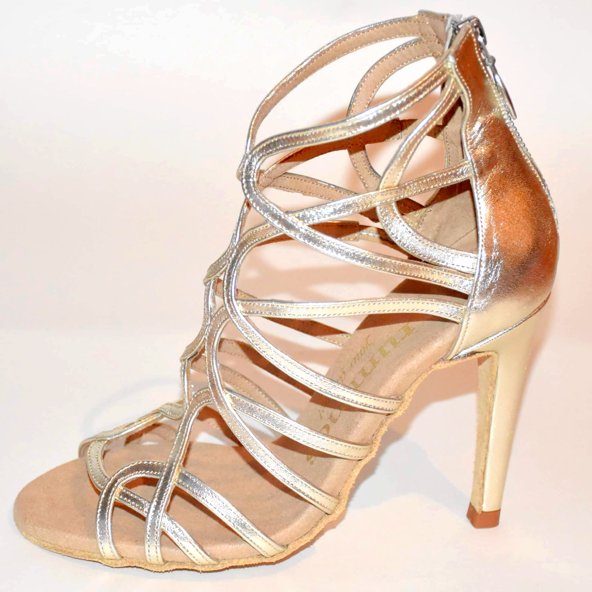 Gold high-heeled sandal with intricate strappy design, perfect for dance and stylish occasions.