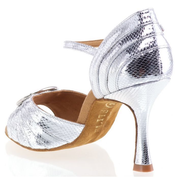 Elegant silver dance shoe with crystal brooch, ideal for salsa and tango, featuring a comfortable design and stable heel.