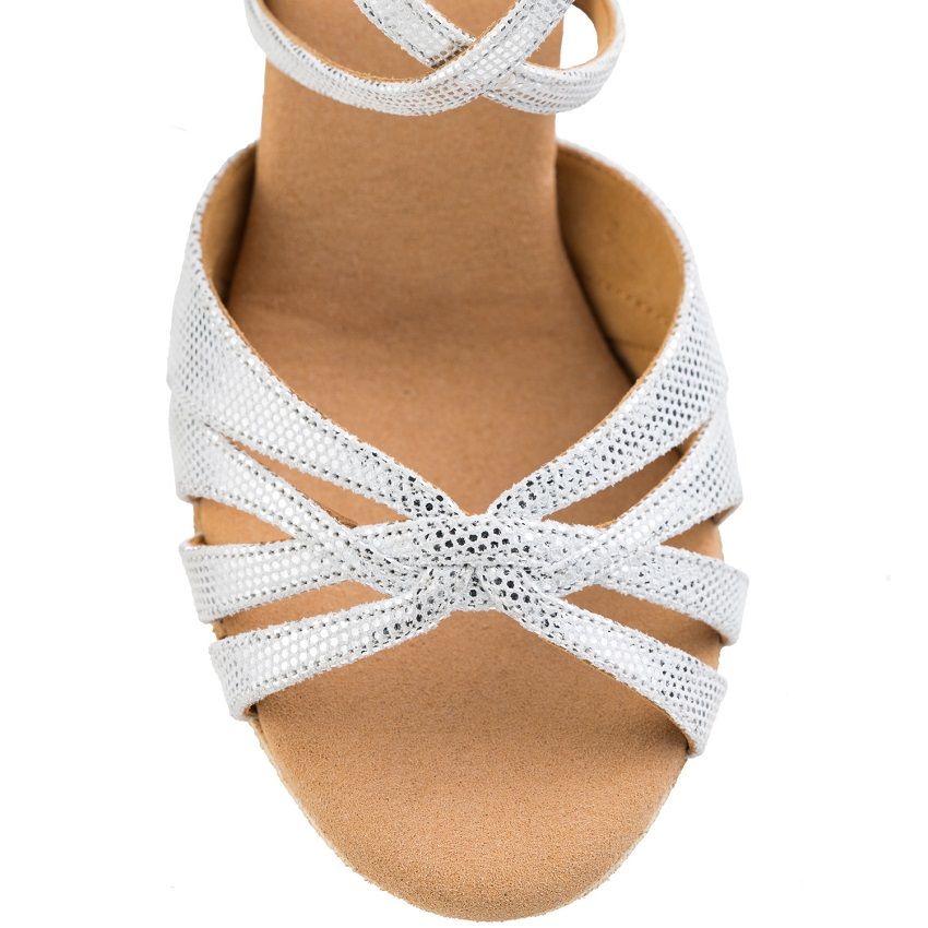 Elegant white 'Wear & Dance' sandal featuring flexible straps and cushioned insole for dancers.