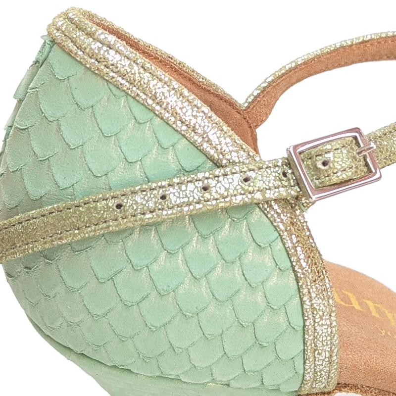 Handcrafted mint leather shoe featuring unique scales and gold accents, designed for comfort and stability in Latin dance.