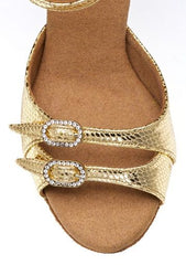 Elite Elena 050 gold dance shoe with decorative buckles, designed for comfort and stability in Latin dancing.