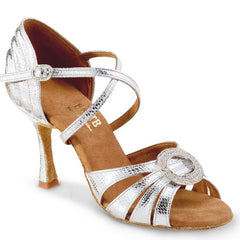 Elegant silver dance shoe with sparkling brooch, perfect for brides and Latin dancers.