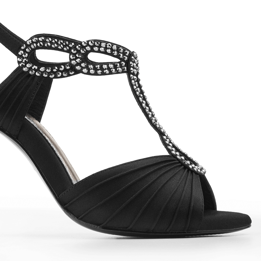 Handcrafted black T-strap sandals with crystal embellishments, designed for comfort and flexibility in dance.